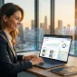 Real estate agent analyzing property listings and local SEO performance on laptop with city skyline background